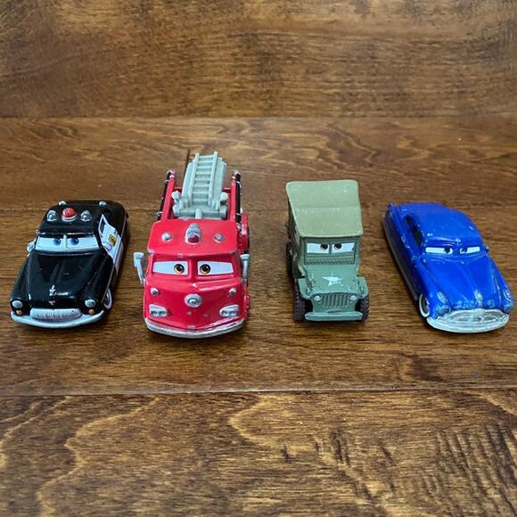 DISNEY PIXAR CARS Vintage Metal Diecast Sheriff Red Sarge Doc Hudson - Picture 1 of 4